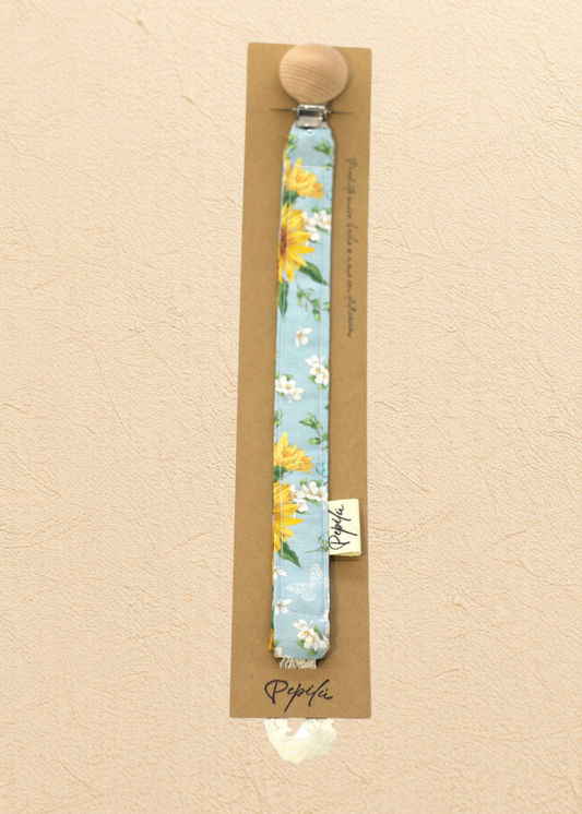 Porta Chupete Girasol Light Blue Circulo.