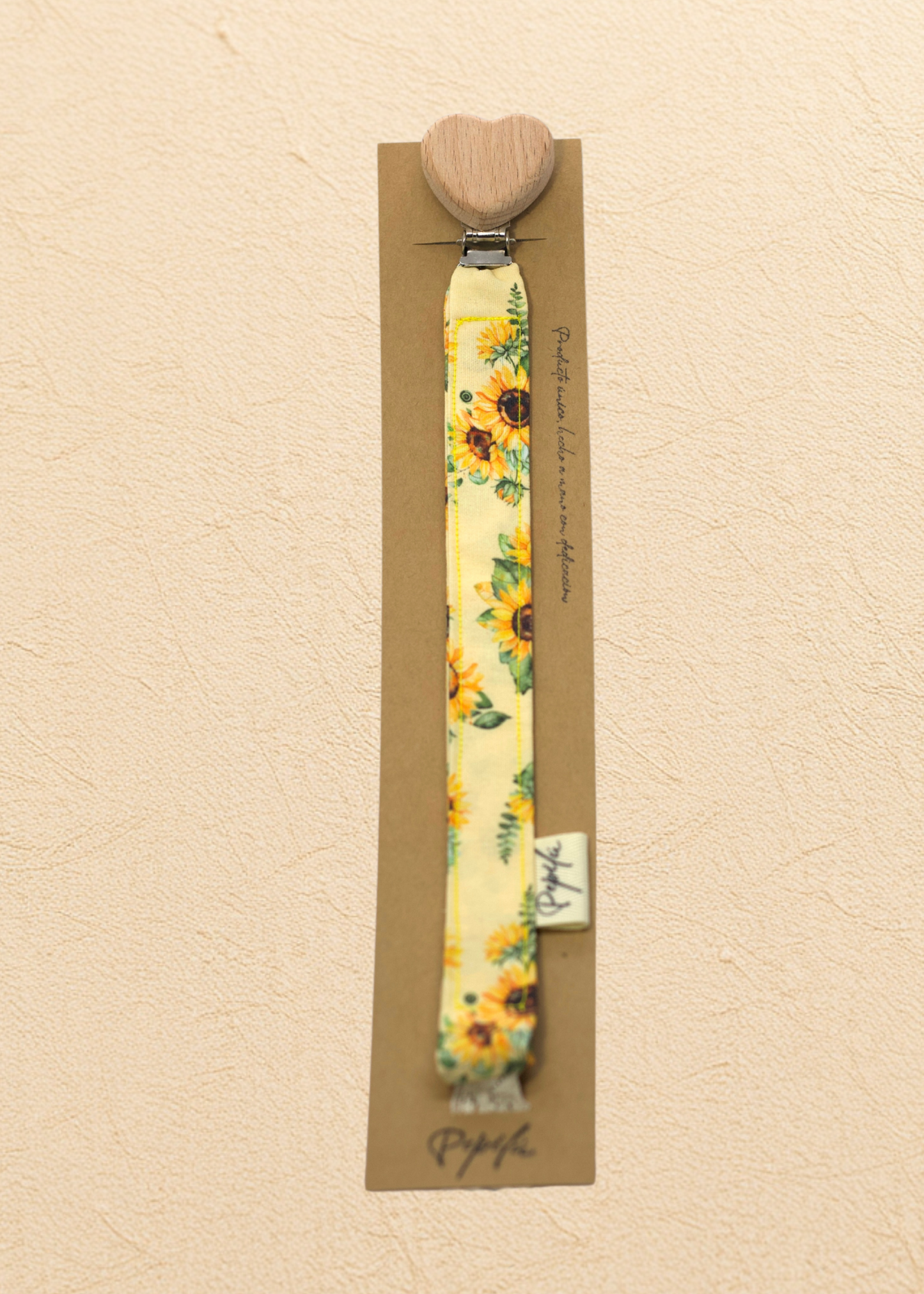 Porta Chupete Girasol Corazón.