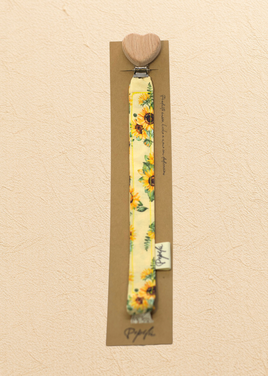 Porta Chupete Girasol Corazón.