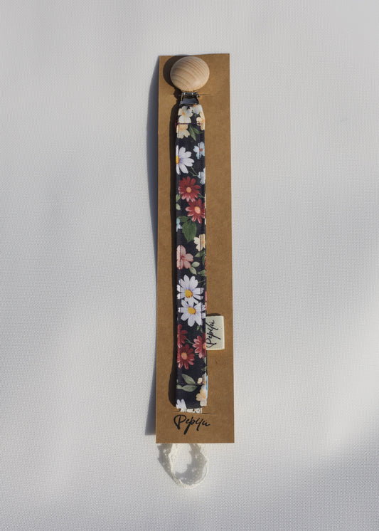 Porta Chupete Flores Circulo.